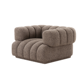 Lahti Armchair with cloud shape design, plush upholstery, and modern cozy style for living rooms and lounges.